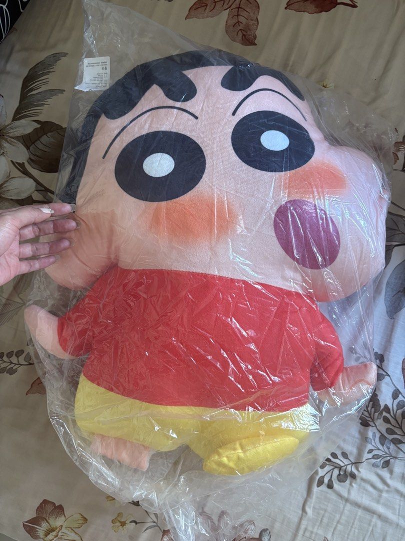 Crayon Shin-chan Large Plush Toy Doll (Category: Plushies & Soft Toys) located in Guiguinto. Submitted by sheena4 (Listing ID 1470502368, Image 2). Description: - Authentic Crayon Shin-chan plush pillow - Wears his iconic red shirt and yellow shorts - Super soft, huggable material - Brand new and sealed in plastic for cleanliness - Great size for bed or couch cuddling - Perfect gift for anime fans.