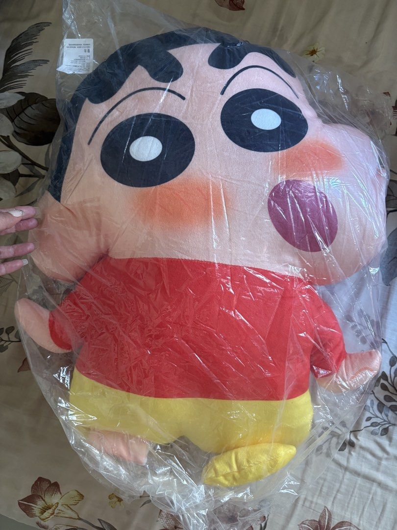 Crayon Shin-chan Large Plush Toy Doll (Category: Plushies & Soft Toys) located in Guiguinto. Submitted by sheena4 (Listing ID 1470502368, Image 1). Description: - Authentic Crayon Shin-chan plush pillow - Wears his iconic red shirt and yellow shorts - Super soft, huggable material - Brand new and sealed in plastic for cleanliness - Great size for bed or couch cuddling - Perfect gift for anime fans.