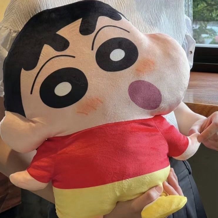 Crayon Shin-chan Large Plush Toy Doll (Category: Plushies & Soft Toys) located in Guiguinto. Submitted by sheena4 (Listing ID 1470502368, Image 3). Description: - Authentic Crayon Shin-chan plush pillow - Wears his iconic red shirt and yellow shorts - Super soft, huggable material - Brand new and sealed in plastic for cleanliness - Great size for bed or couch cuddling - Perfect gift for anime fans.
