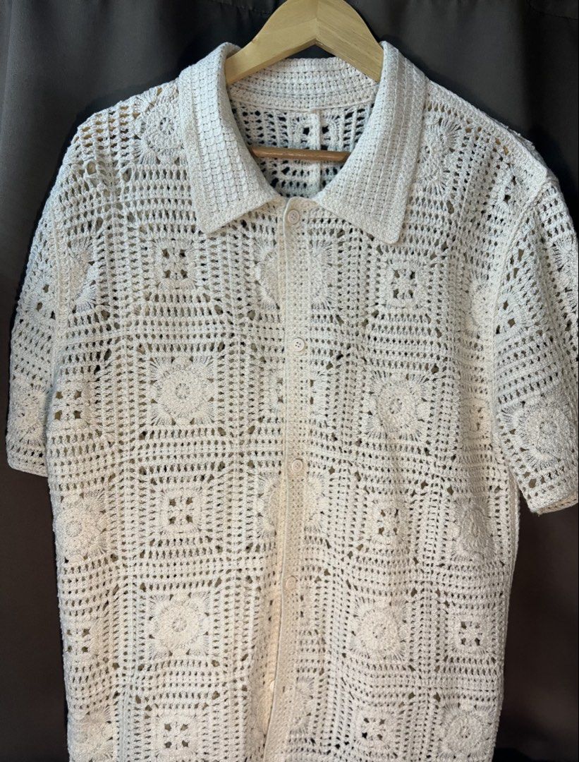 Cream Crochet Polo (Shein) (Category: Tshirts & Polo Shirts ) located in Manila. Submitted by rrr.decoolter.888 (Listing ID 1470522841, Image 1). Description: - Style: Cream crochet knit short sleeve shirt with classic collar and front buttons - Size: 27x20 - Design: All-over open weave floral square pattern - Condition: 10/10 super nice in person! .