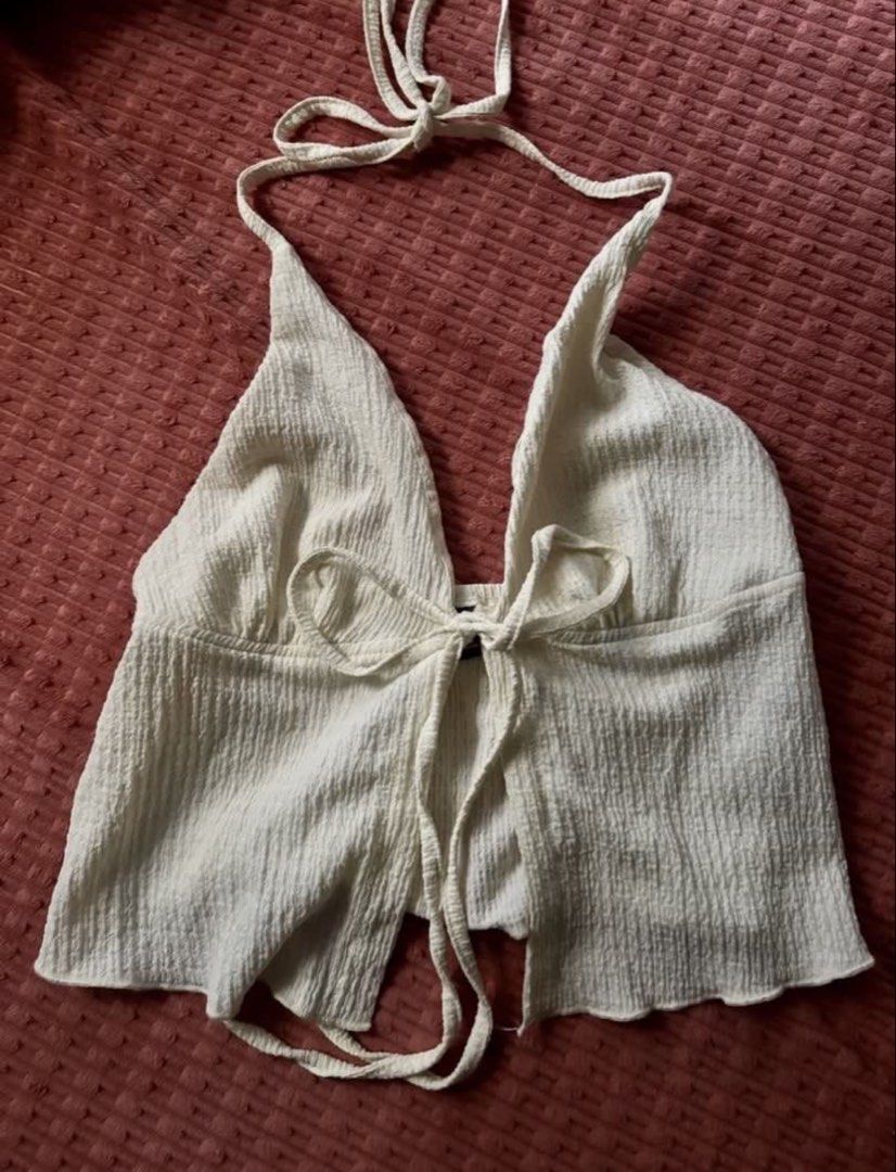 Cream Halter Top and Matching Pants Set (Category: Sets or Coordinates) located in Manila. Submitted by yas__ (Listing ID 1470436302, Image 3). Description: - Color: Cream / Neutral - Material: Crinkled textured fabric - Top: Halter neck crop top with front tie closure - Bottoms: High-waisted pants with comfortable elastic waistband - Style: Summer trips, beach getaways, or casual daily wear - Condition: Brand new - MOP: GCash, BPI - Shipping: Vi