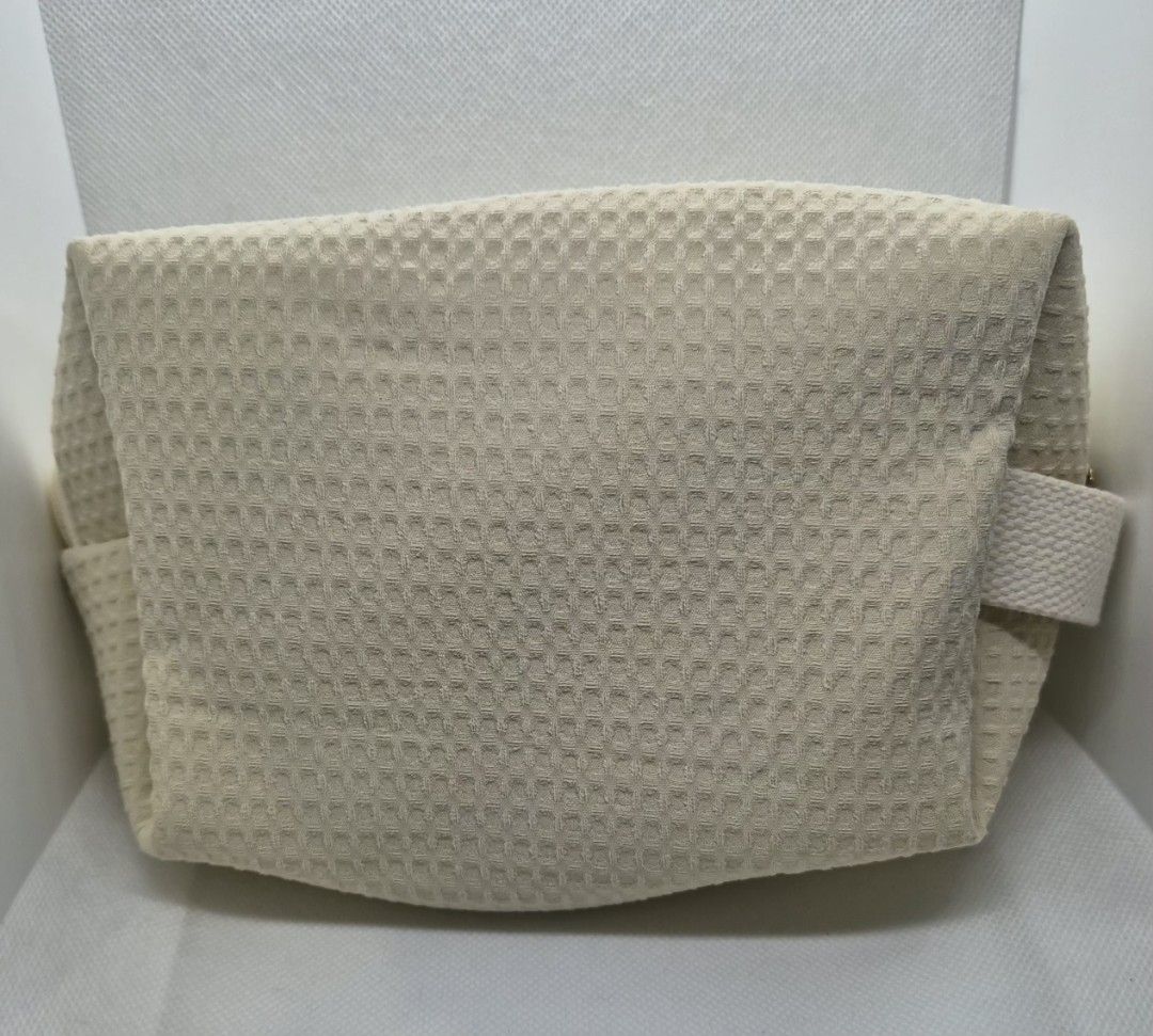 Cream Waffle Cosmetic Pouch with Envelope Embroidery (Category: Purses & Pouches) located in Manila. Submitted by prelovedbyc.hannah (Listing ID 1470358678, Image 2). Description: - Free pouch upon purchase of any Dior cosmetic set - Color & Material: Cream-coloured waffle fabric - Design: Cute embroidered love letter envelope with a tiny red heart - Interior: Fully lined in white fabric with built-in slip pockets - Hardware: Sturdy white zipper 