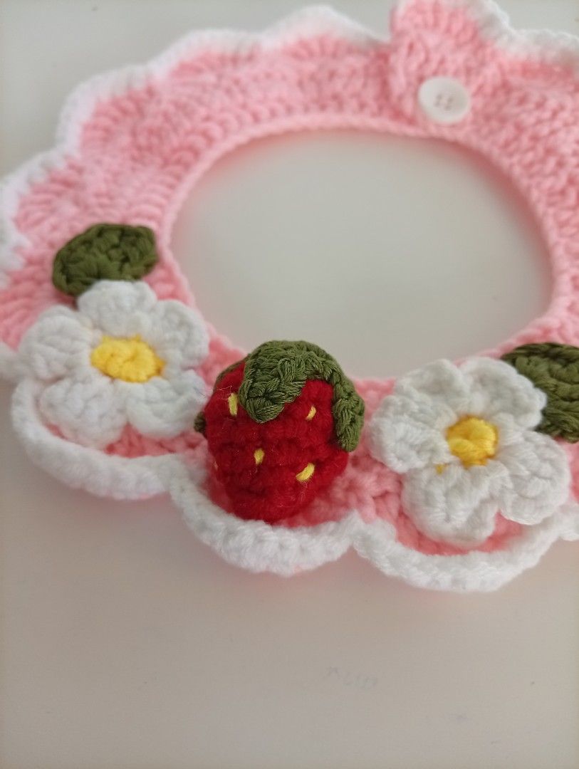 Crochet Pet Collar 🐶😻🍓🌸 (Category: Homes & Other Pet Accessories) located in Taguig. Submitted by arcattect (Listing ID 1470465372, Image 2). Description: to check legitimacy- @ar.cat.tect on ig Handmade by me ✨ + details are sewn in, not glued (prevents details from detaching over time) + button/lace tie option ‼️Price stated is only the starting price . ‼️ Price will vary depending on the neck size of the pet ‼️ Small size pets (cats, small
