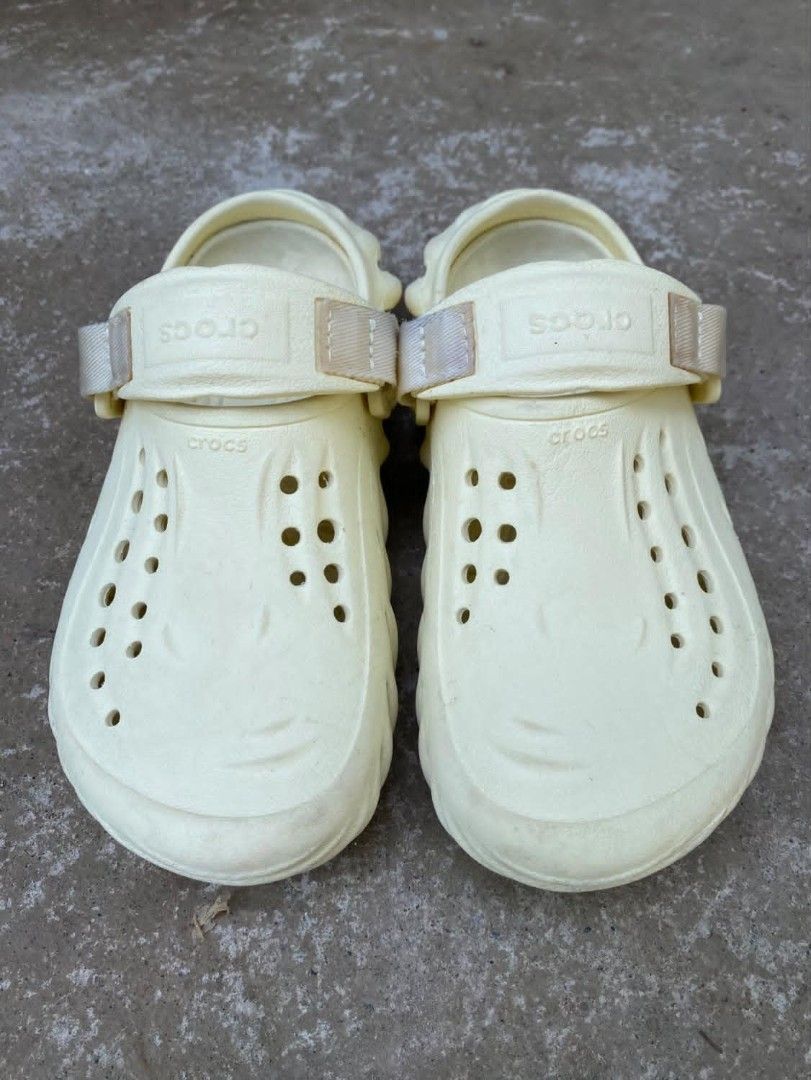 Crocs Echo Clog Bone Off-White (Category: Slippers and slides) located in Manila. Submitted by thrifterxbarber (Listing ID 1470510658, Image 3). Description: - Brand: Crocs - Model: Echo Clogs - Color: Bone - Size: [Insert Size] - Features: Lightweight molded design, ventilation ports, adjustable hook-and-loop heel strap, and textured tread - Condition: Normal signs of wear on soles and upper; mostly dusty from storage - Perfect for daily casual 