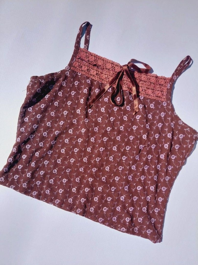 Crop brown sheer top (Category: Sleeveless) located in Echague. Submitted by ribbitpicks (Listing ID 1470430673, Image 3). Description: bust 32.