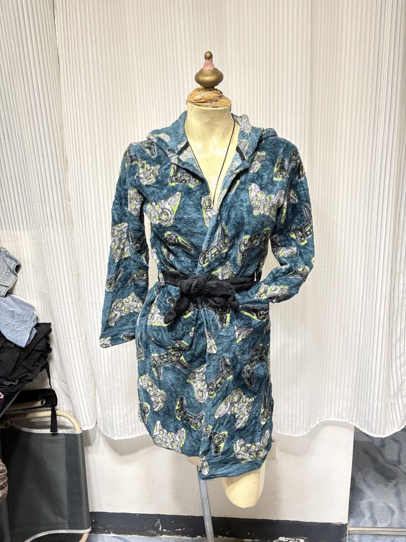 Cuddl Duds Plush Video Game Pattern Bathrobe Hooded (Category: Coats, Jackets and Outerwear) located in General Trias. Submitted by crissy9053136 (Listing ID 1470487101, Image 1). Description: - Brand: Cuddl Duds - Color: Dark teal blue with grey and lime green video game controller print - Material: Super soft and warm plush fleece - Features: Attached hood, long sleeves, front pockets, and black tie belt - Condition: Excellent lounge piece, tag