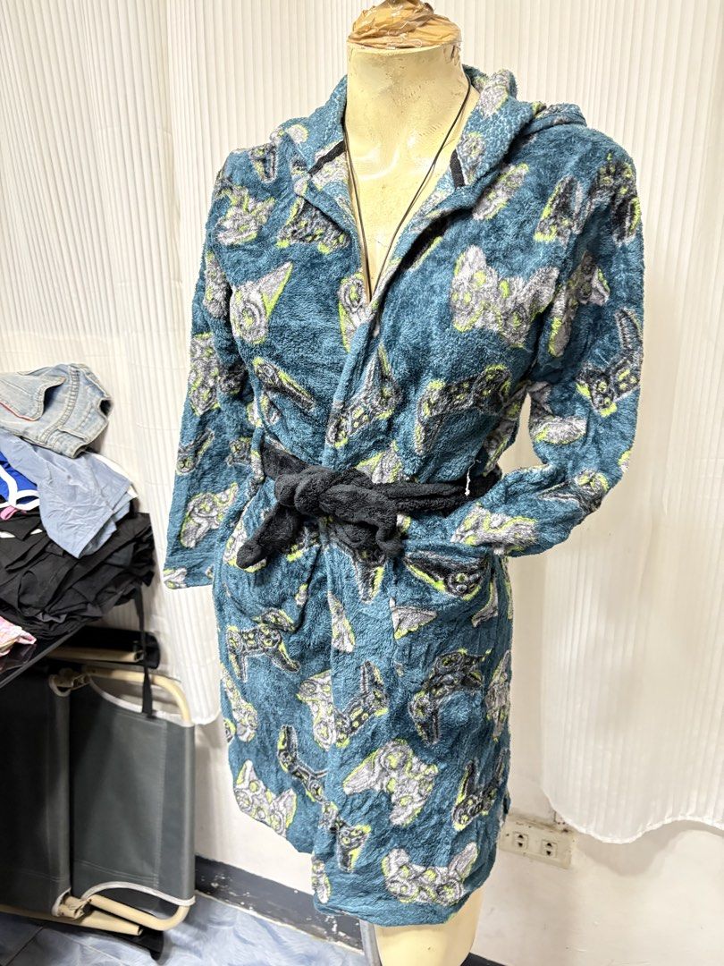 Cuddl Duds Plush Video Game Pattern Bathrobe Hooded (Category: Coats, Jackets and Outerwear) located in General Trias. Submitted by crissy9053136 (Listing ID 1470487101, Image 2). Description: - Brand: Cuddl Duds - Color: Dark teal blue with grey and lime green video game controller print - Material: Super soft and warm plush fleece - Features: Attached hood, long sleeves, front pockets, and black tie belt - Condition: Excellent lounge piece, tag