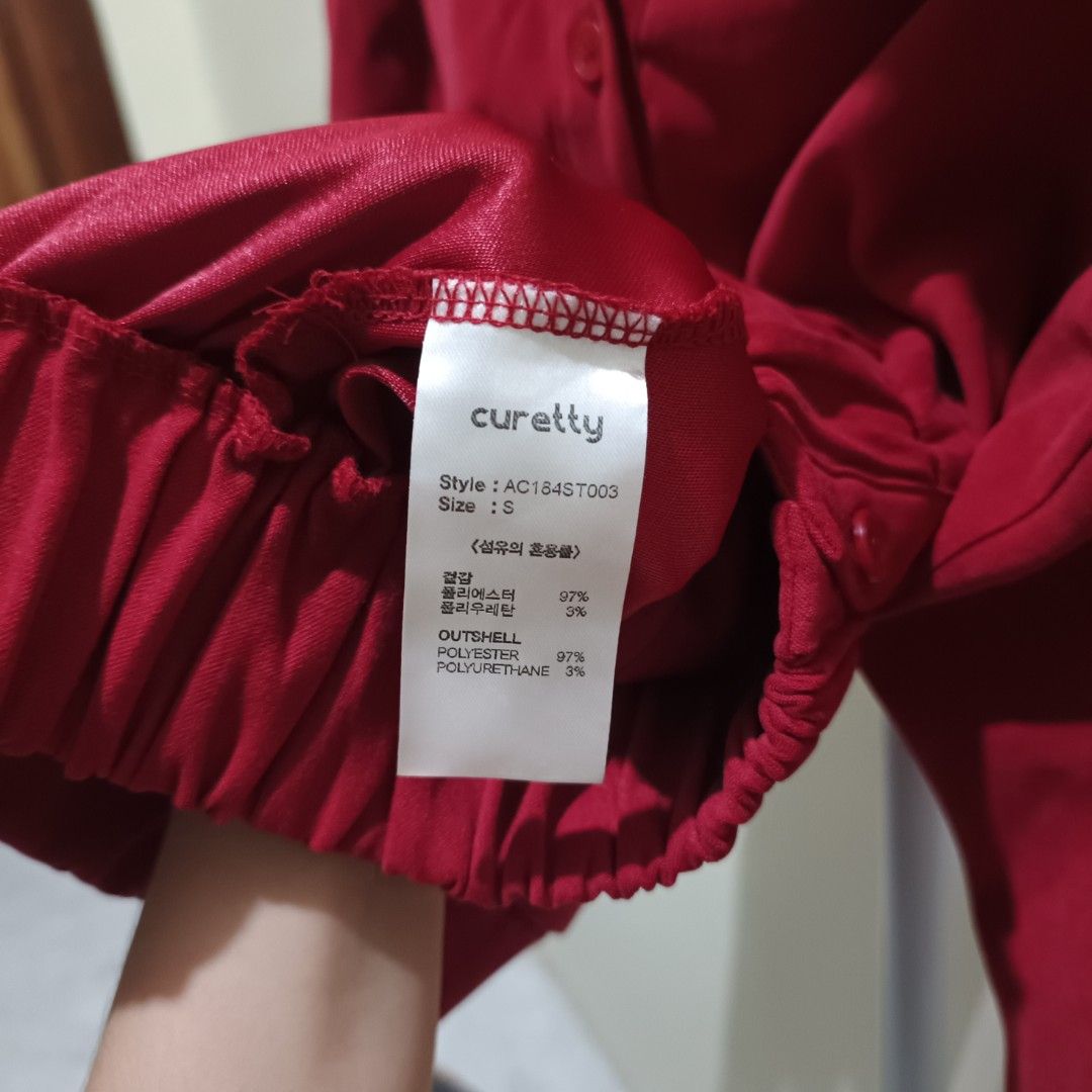 Curetty Red Button-Up Jacket Size S (Category: Coats, Jackets and Outerwear) located in Davao. Submitted by jjj_mncd (Listing ID 1470528001, Image 3). Description: - Brand: Curetty - Size: S - Color: Maroon - Style Number: AC164ST003 - Material: 97% polyester, 3% polyurethane (lightweight) - Features: Collared neck, front button-up, long sleeves with elastic cuffs, elastic hem - Condition: Great for casual everyday styling.