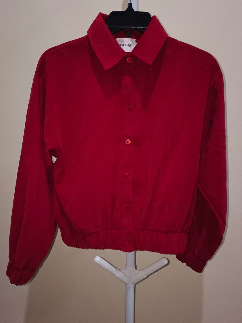 Curetty Red Button-Up Jacket Size S (Category: Coats, Jackets and Outerwear) located in Davao. Submitted by jjj_mncd (Listing ID 1470528001, Image 1). Description: - Brand: Curetty - Size: S - Color: Maroon - Style Number: AC164ST003 - Material: 97% polyester, 3% polyurethane (lightweight) - Features: Collared neck, front button-up, long sleeves with elastic cuffs, elastic hem - Condition: Great for casual everyday styling.