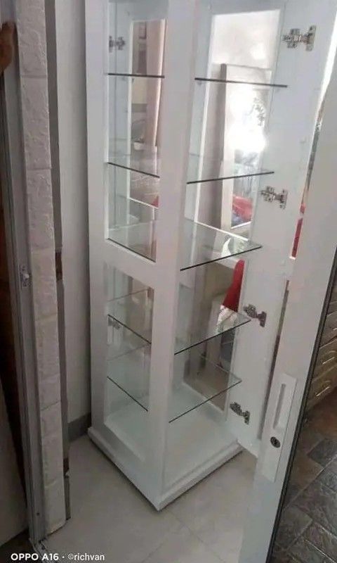Curio glass cabinet with pin light (Category: Shelves, Cabinets & Racks) located in Mabalacat. Submitted by joemamangun01 (Listing ID 1470464898, Image 3). Description: .
