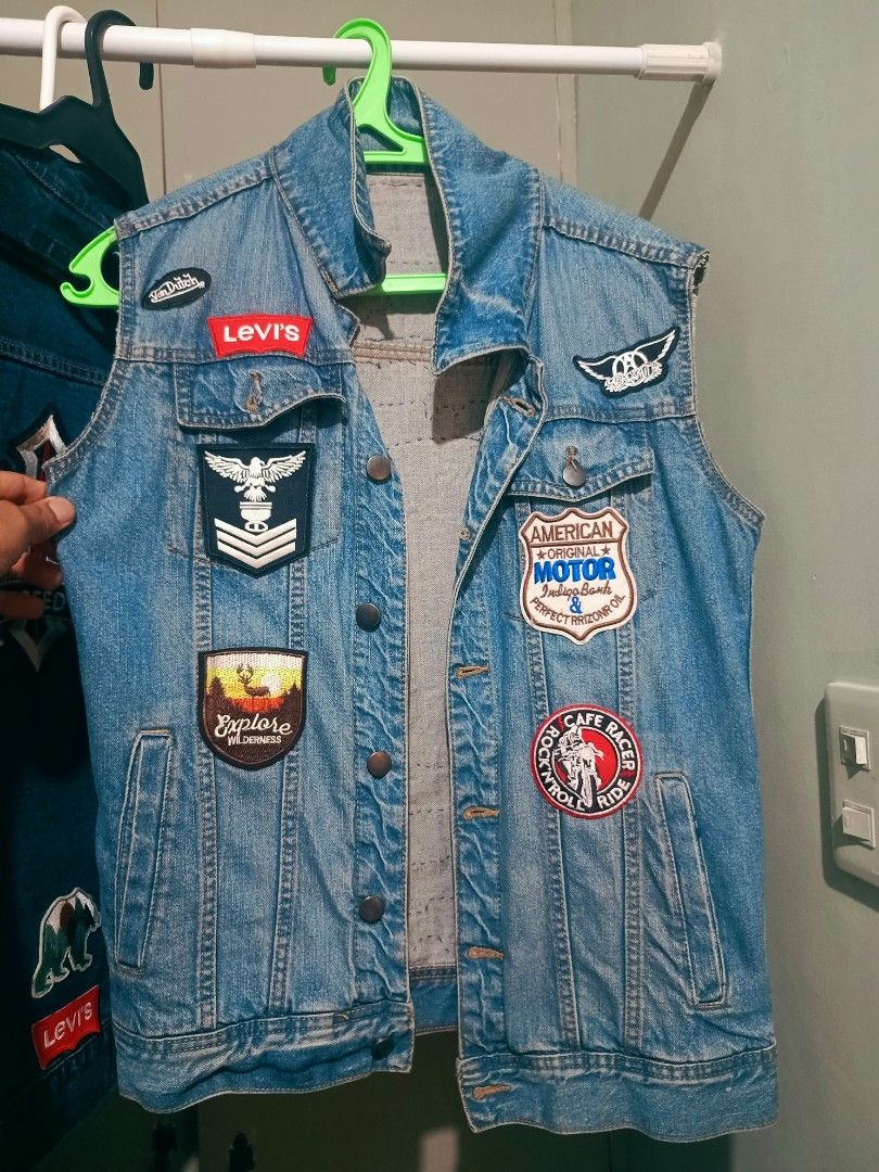 Custom Denim Jacket Vest Patchwork Rock Band Patches (Category: Coats, Jackets and Outerwear) located in Manila. Submitted by astiga (Listing ID 1470470310, Image 1). Description: - Custom DIY denim battle vest featuring a heavy wash and button-up closure - Back loaded with embroidered rock and metal band patches (Nirvana, Metallica, Iron Maiden, Megadeth, Guns N Roses, AC/DC, Black Sabbath) and Route 66 - Front accented with Levi's branding, Ame