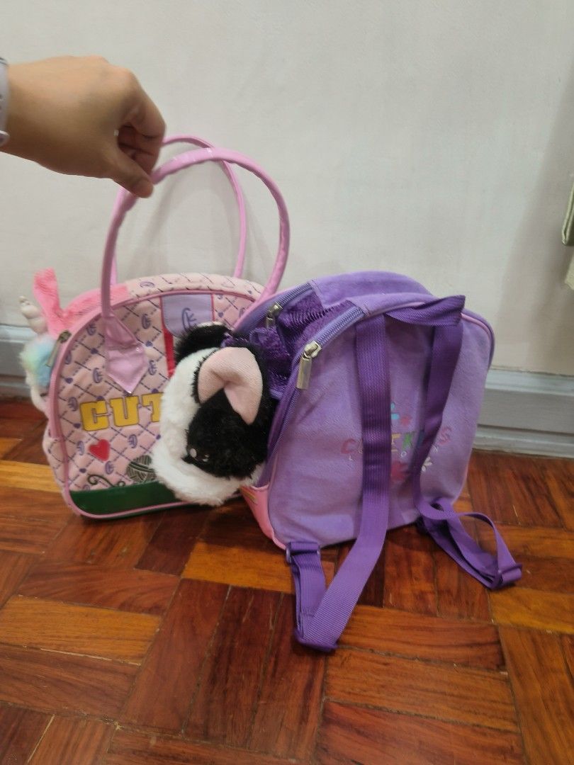 Cutekins bag with Plush Toys (Category: Backpacks) located in Manila. Submitted by cleverdog_a9b18a (Listing ID 1470351477, Image 2). Description: includes: pink shoulder bag and unicorn stufftoy purple bagpack witth dog stuff toy.