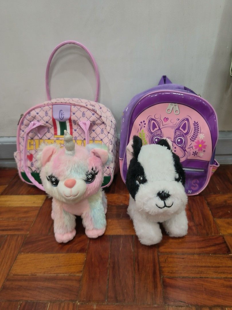 Cutekins bag with Plush Toys (Category: Backpacks) located in Manila. Submitted by cleverdog_a9b18a (Listing ID 1470351477, Image 1). Description: includes: pink shoulder bag and unicorn stufftoy purple bagpack witth dog stuff toy.