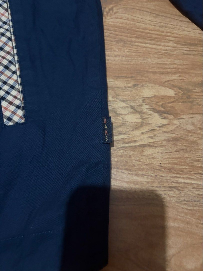 DAKS Reversible Plaid and Navy Jacket (Category: Coats, Jackets and Outerwear) located in Balanga. Submitted by momstyle.ph (Listing ID 1470440404, Image 3). Description: - DAKS reversible jacket - Side 1: Solid navy with branded tab and patterned pocket trim - Side 2: Classic beige check heritage pattern - Full front zipper closure - Pointed collar and button cuffs - 2-in-1 versatile style UNISEX SALE PRICE❤️.