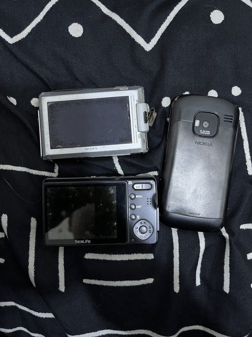 Damaged Digicams and Nokia E5 (Category: Cameras) located in Magalang. Submitted by kairu530 (Listing ID 1470485371, Image 2). Description: BUY AT YOUR OWN RISK. ALL NOT ITEMS ARE NOT WORKINNG CONDITION BEST OFFER WINS.