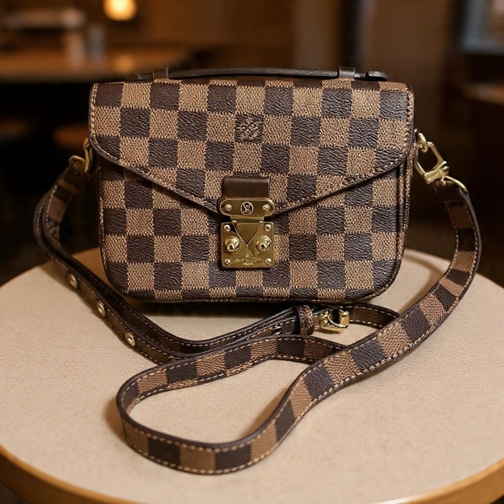 Damier Metis (Category: Shoulder Bags) located in Quezon City. Submitted by luxxechic (Listing ID 1470516469, Image 1). Description: coded adjustable strap with dust bag good as new no issue actual photo posted japan preloved mop: gcash.