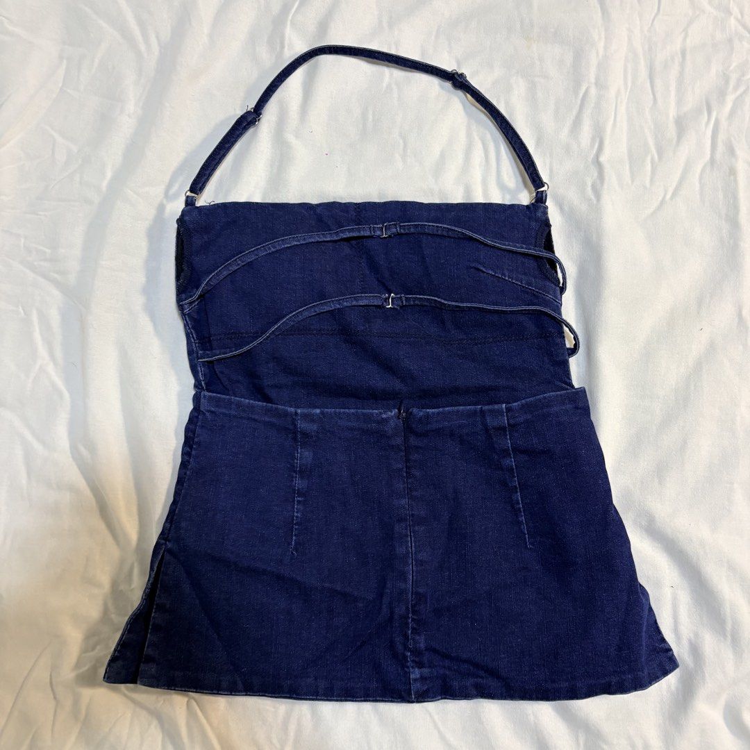 Dark Blue Denim Halter Top with Back Straps (Category: Sleeveless) located in Manila. Submitted by yiiio3o (Listing ID 1470503793, Image 2). Description: Size: Free Size Condition: Brand New RFS: Back too revealing for me 📍Binondo, Manila.