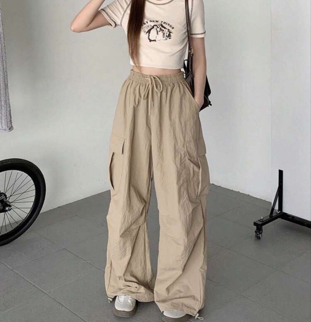 Dazy Beige Cargo Pants Large (Category: Jeans) located in Rizal. Submitted by kianapreloves (Listing ID 1470506545, Image 1). Description: - Color: Neutral beige - Fit: High-waisted with an elastic waistband and adjustable drawstring - Style: Loose, wide-leg cut with side utility pockets - Material: Comfortable fabric ideal for daily wear - Versatility: Easy to pair with casual tops and tees.