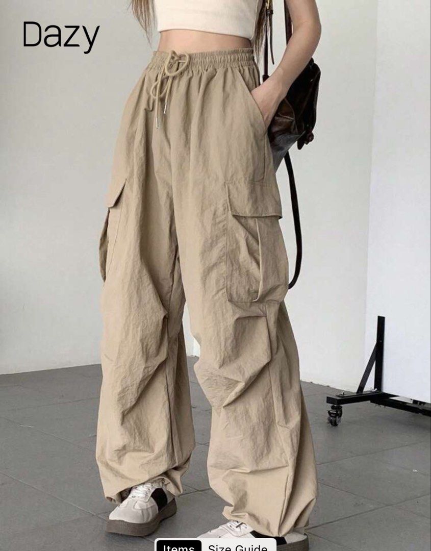 Dazy Beige Cargo Pants Large (Category: Jeans) located in Rizal. Submitted by kianapreloves (Listing ID 1470506545, Image 2). Description: - Color: Neutral beige - Fit: High-waisted with an elastic waistband and adjustable drawstring - Style: Loose, wide-leg cut with side utility pockets - Material: Comfortable fabric ideal for daily wear - Versatility: Easy to pair with casual tops and tees.