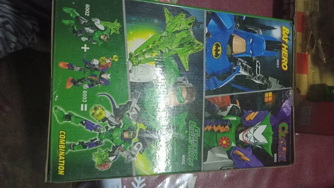 Decool Super Heroes Green Light Man Building Toy 6002 (Category: Lego & Building Sets) located in Manila. Submitted by wisegem-231b (Listing ID 1470396906, Image 2). Description: Decool Super Heroes building set, model 6002 Green Light Man. Includes character figure and accessories in box. Suitable for ages six and up. Part of a series where sets combine for bigger builds. Box shows some wear from storage. Fun build for superhero fans..