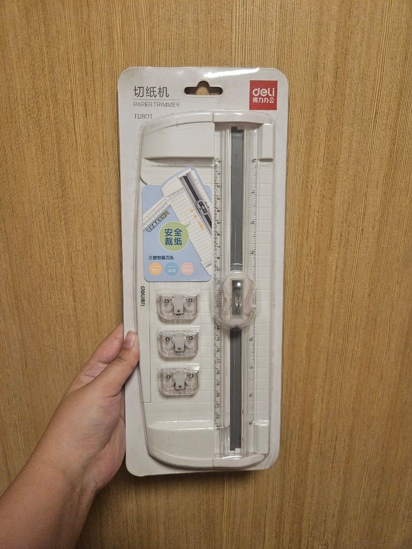 Deli Paper Trimmer Portable Cutter (Category: Craft Supplies & Tools) located in Manila. Submitted by declutter_daruma (Listing ID 1470458285, Image 1). Description: RFS: Rush decluttering. Not new. Used item please manage your expectations.