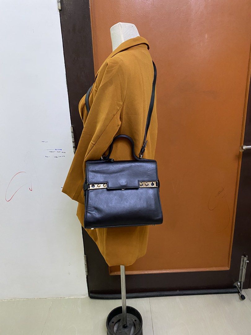 Delvaux (Category: Cross-body Bags) located in Buhi. Submitted by nyleeshop0.0 (Listing ID 1470523674, Image 3). Description: Delvaux Bag with white tag see last 2 photos of pressed mark Msg for further inquiry if any price + sf.