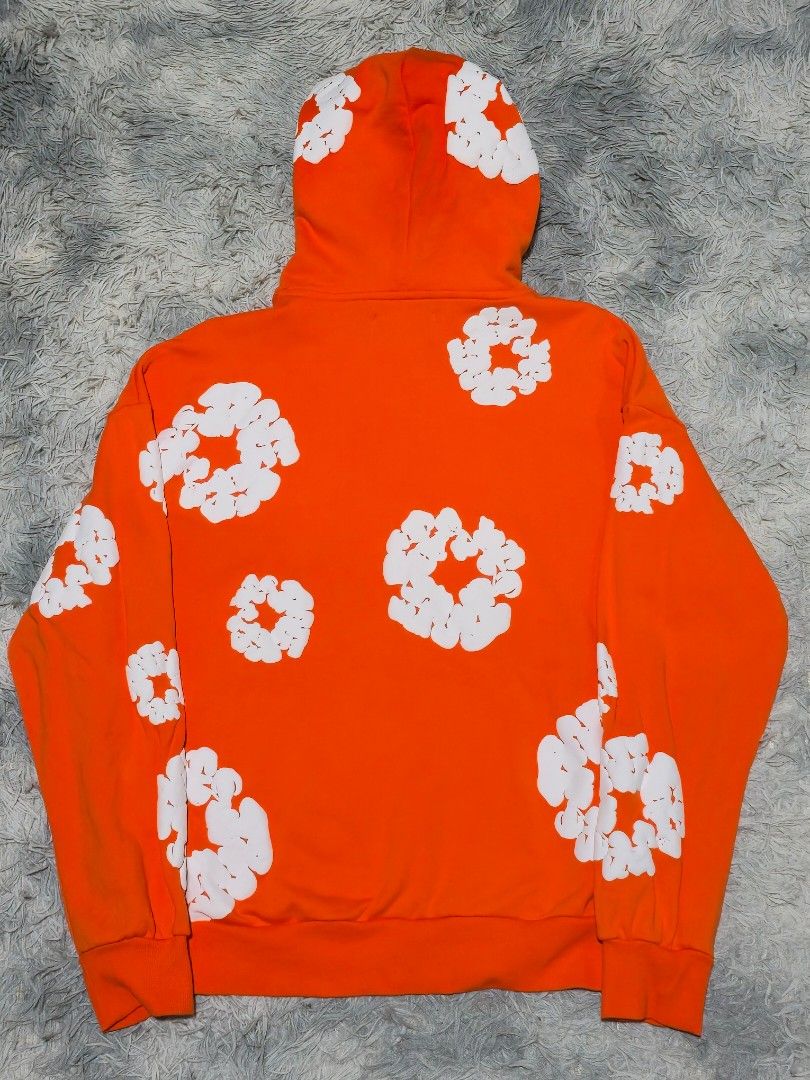 Denim Tears Orange Hoodie (Category: Hoodies) located in Abulug. Submitted by humanwhosellthings (Listing ID 1470482940, Image 2). Description: DENIM TEARS OVERSIZED HOODIE ✅️Size: Small on tag fit to Large ✅️Dimes: 24W x 26L ✅Condition: Like New ✅Issue: small dot stain ✅Color Rate: 10/10.