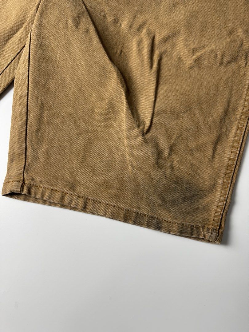 Dickies Brown Cargo Work Shorts (Category: Shorts) located in Cavite. Submitted by dracokidstuff (Listing ID 1470373105, Image 3). Description: - Brand: Dickies - Style: Classic carpenter work shorts with side utility pockets - Material: Durable brown canvas - Features: Button closure and belt loops - Condition: Pre-loved with some wear and dark marks near the bottom hems from actual work use.