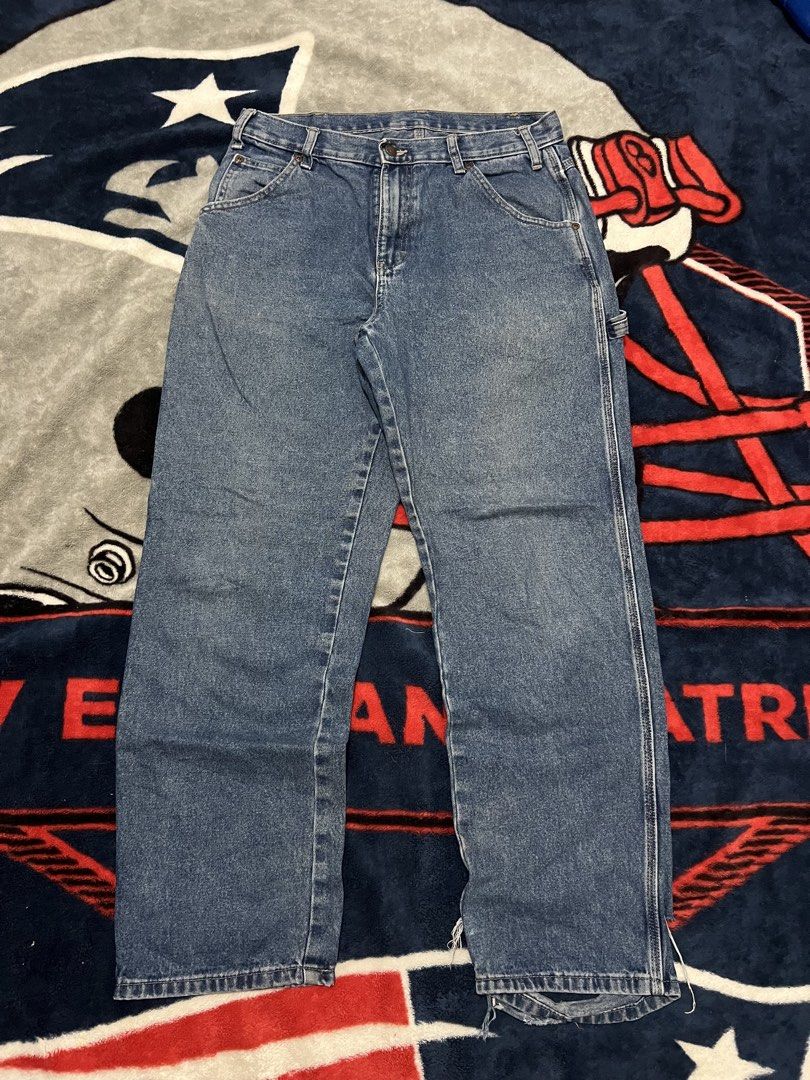 Dickies Carpenter Denim Jeans Blue (Category: Jeans) located in Tanza. Submitted by 1954_street (Listing ID 1470376776, Image 3). Description: DICKIES CARPENTER PANTS 32 waist 40 length 9 leg op cut parts on hem 800 - Brand/Style: Dickies denim carpenter jeans in a classic blue wash - Fit: Straight leg - Features: Utility side pockets and attached hammer loop - Details: Distressed fraying at the back waistband and bottom hems - Material: Durable 