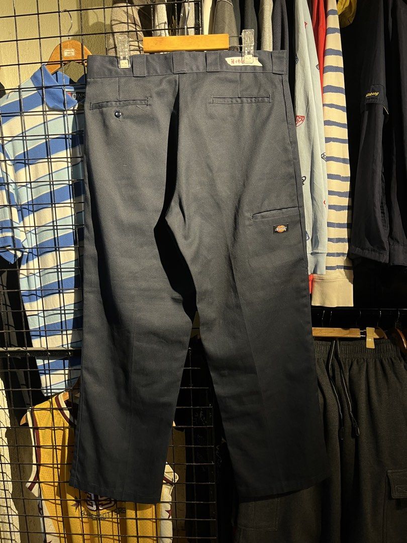 Dickies Loose Fit Double Knee Work Pants Navy (Category: Jeans) located in Manila. Submitted by roballenad66487 (Listing ID 1470386256, Image 1). Description: - Brand: Dickies - Item: Double knee work pants - Color: Navy blue - Fit: Loose fit, wide leg - Material: Heavy-duty twill fabric - Details: Classic woven logo patch on front leg pocket, cream inner waistband with printed branding - Style: Classic streetwear staple - Note: Message for measu
