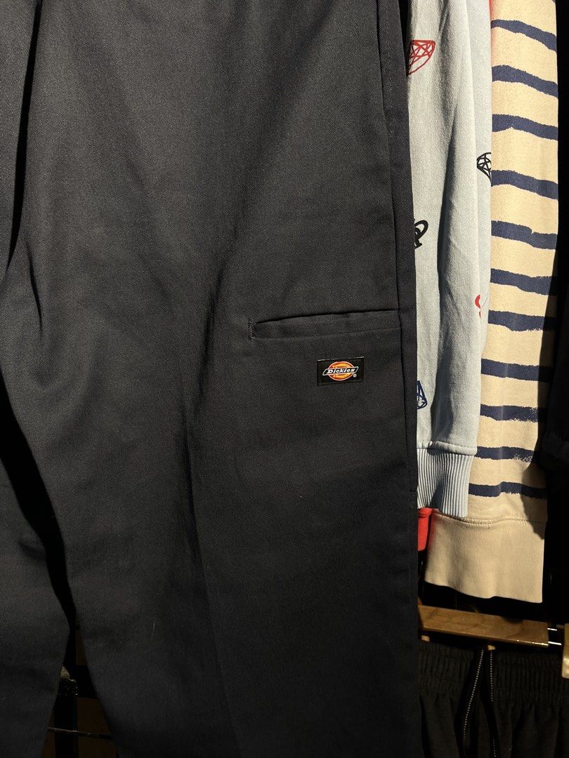 Dickies Loose Fit Double Knee Work Pants Navy (Category: Jeans) located in Manila. Submitted by roballenad66487 (Listing ID 1470386256, Image 2). Description: - Brand: Dickies - Item: Double knee work pants - Color: Navy blue - Fit: Loose fit, wide leg - Material: Heavy-duty twill fabric - Details: Classic woven logo patch on front leg pocket, cream inner waistband with printed branding - Style: Classic streetwear staple - Note: Message for measu