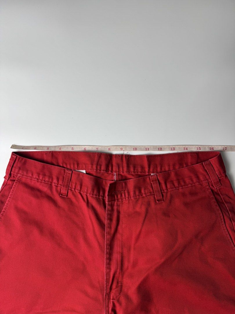 Dickies Red Work Shorts (Category: Shorts) located in Cavite. Submitted by dracokidstuff (Listing ID 1470373189, Image 3). Description: - Brand: Dickies - Color: Bold Red - Style: Work shorts with multiple pockets and utility leg pocket - Details: Classic logo patch near hem, clean stitching - Measurements: 16.5" waist across, 24" total length, 14" leg opening - Condition: Sturdy fabric made for daily wear.