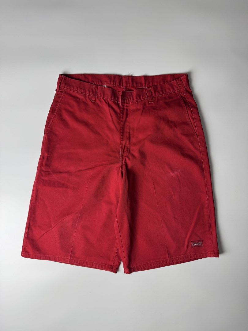Dickies Red Work Shorts (Category: Shorts) located in Cavite. Submitted by dracokidstuff (Listing ID 1470373189, Image 2). Description: - Brand: Dickies - Color: Bold Red - Style: Work shorts with multiple pockets and utility leg pocket - Details: Classic logo patch near hem, clean stitching - Measurements: 16.5" waist across, 24" total length, 14" leg opening - Condition: Sturdy fabric made for daily wear.