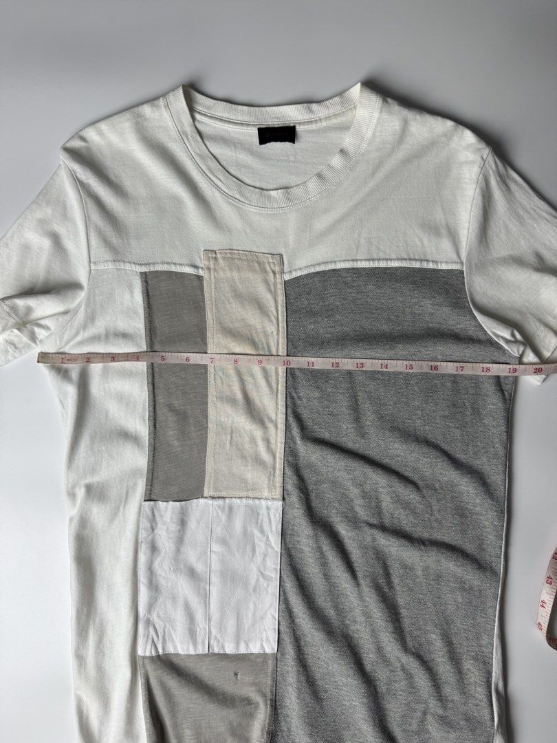 Diesel Patchwork Layered Tee Grey White (Category: Tshirts & Polo Shirts ) located in Cavite. Submitted by loadeadgears (Listing ID 1470370597, Image 3). Description: - Brand: Diesel - Style: Layered patchwork t-shirt - Color: White and grey - Neckline/Sleeves: Crew neck, short sleeves - Measurements: Pit to pit ~20 inches, Total length ~30 inches - Condition: Pre-loved with a couple of tiny holes on the lower front panels near the hem (refer to 