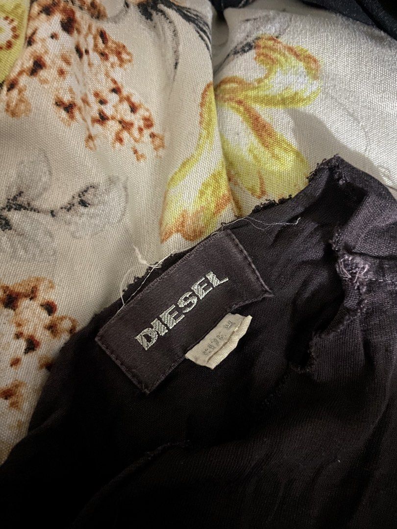 Diesel Reworked Tank Top (with tags) (Category: Sleeveless) located in Marikina City. Submitted by bebeplumm (Listing ID 1470501372, Image 3). Description: No issues just a sign of usage Authentic Still negotiable DM FOR MORE INFO.
