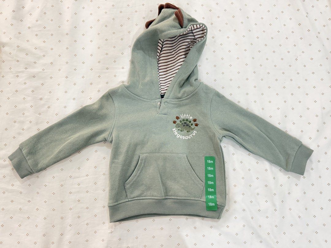 Dinosaur Hoodie (18M) (Category: Babies & Kids Fashion) located in Manila. Submitted by diane.preloved0328 (Listing ID 1470426950, Image 1). Description: Kids Headquarters Stegosaurus Hoodie 18M.
