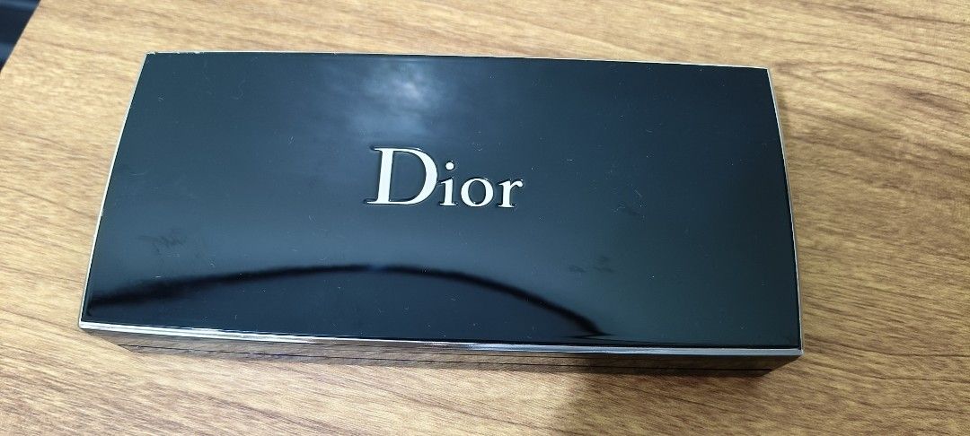 Dior Color Designer Makeup Palette (Category: Makeup) located in Manila. Submitted by truetree-3c99a8 (Listing ID 1470499823, Image 3). Description: - All-in-one luxury makeup palette by Dior - Includes eyeshadows, blush, concealer, powder, lip gloss, eyeliner, mascara, and applicator tools - Sleek black mirrored case with clear shade details on the back - Compact size, perfect for travel or quick daily touch-ups - Guaranteed authentic RFS: Hindi