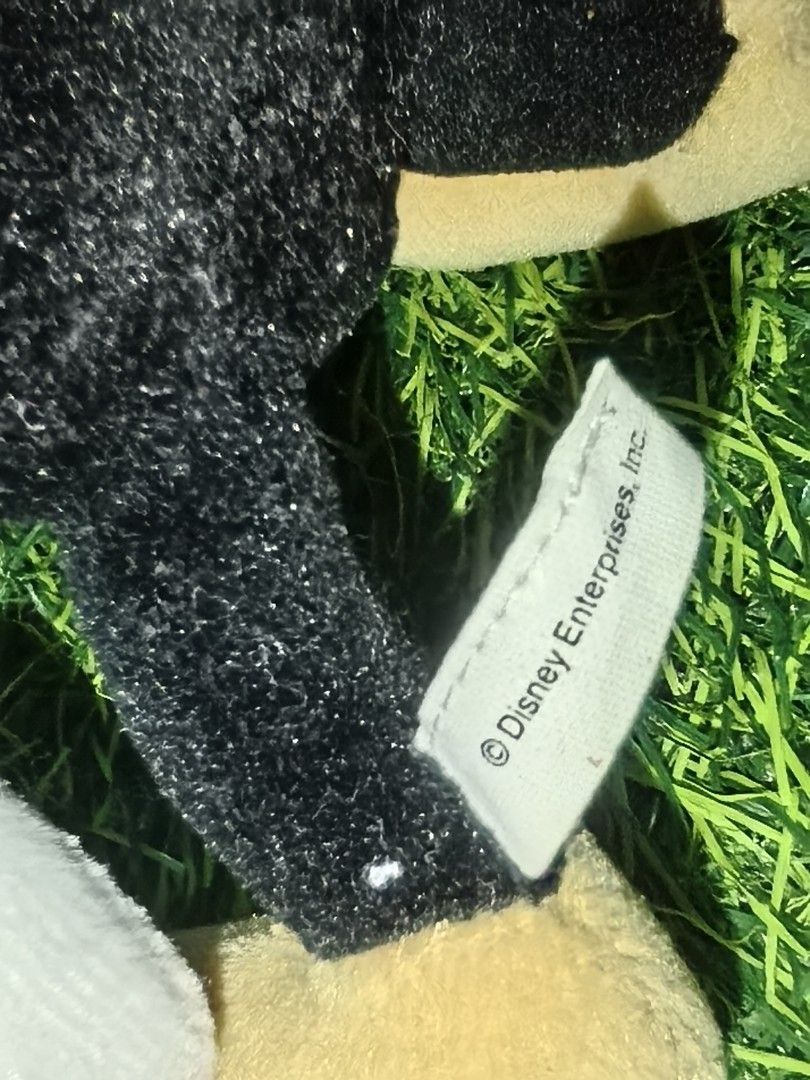 Disney Goofy Plush Toy (Category: Plushies & Soft Toys) located in Paranaque City. Submitted by furugiyafinds (Listing ID 1470457480, Image 3). Description: - Official Disney Goofy plush toy with authentic Disney Enterprises Inc. back tag - Classic outfit featuring a green vest, yellow hat, white gloves, and yellow shoes - Made with ultra-soft and cuddly fabric material - Designed in a cute, stable sitting pose - Great addition to any Disney coll