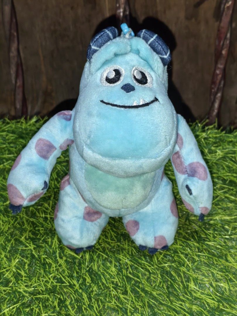 Disney Pixar Monsters Sulley Plush Keychain (Category: Plushies & Soft Toys) located in Paranaque City. Submitted by furugiyafinds (Listing ID 1470457035, Image 1). Description: - Authentic Disney Pixar Monsters character plush keychain - Features soft blue fabric with iconic purple spots and cute little horns - Equipped with a sturdy plastic clip at the back for easy hanging - Palm-sized, approximately compact and lightweight - Condition: Excell