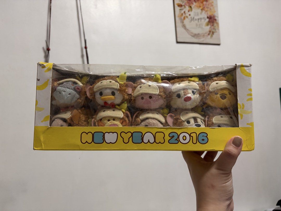 Disney Tsum Tsum New Year 2016 Monkey Plush Box Set (Category: Plushies & Soft Toys) located in Mandaluyong City. Submitted by stuffandshop2017 (Listing ID 1470354193, Image 1). Description: - Authentic Disney Tsum Tsum 2016 New Year monkey collection - Set of 10 miniature plush toys wearing cute monkey outfits with bananas on their heads - Comes in the original yellow display box with a clear plastic window - Rare collector's item, perfect for D