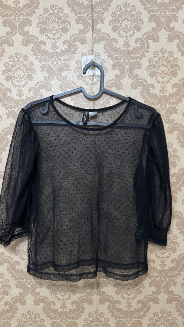 Divided Black Sheer Polka Dot Mesh Blouse (Category: Blouses) located in San Pedro. Submitted by abbbnnn (Listing ID 1470413862, Image 1). Description: - Brand: Divided - Color/Pattern: Black with all-over tiny polka dots - Material: Lightweight sheer mesh - Details: Round neckline, 3/4 sleeves with gathered cuffs - Fit: Slip-on style - Styling: Great for layering over bralettes or camisoles.