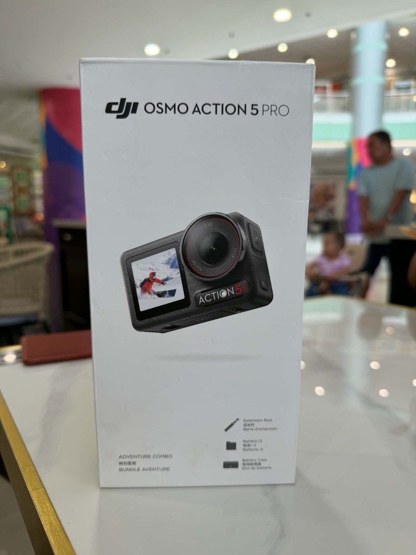 DJI Osmo Action 5 Pro Adventure Combo (Category: Cameras) located in Cavite. Submitted by luxedesign25 (Listing ID 1470410107, Image 2). Description: - DJI Osmo Action 5 Pro Adventure Combo set in original retail box - Fully tested, 100% functional, and ready to shoot - Complete package includes: Camera, 3 batteries, battery charging case, extension rod, protective frame, and magnetic mount - Extras included: Waterproof dive case, Ulanzi mini tri
