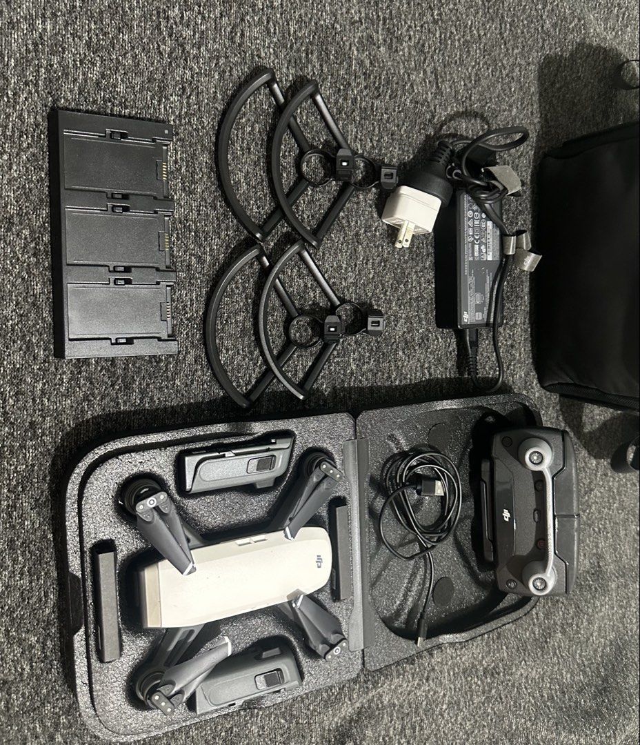 DJI Spark Fly More Combo Drone with Controller and Accessories (Category: Drones) located in Munoz. Submitted by ivan0429 (Listing ID 1470505879, Image 1). Description: - Model: DJI Spark Drone (White) - Condition: Fully operational and flight-ready - Remote controller included - Power setup: Three-battery charging hub, charging brick, and cable - Safety: Propeller guards included - Storage: Hard protective case that fits everything into the incl