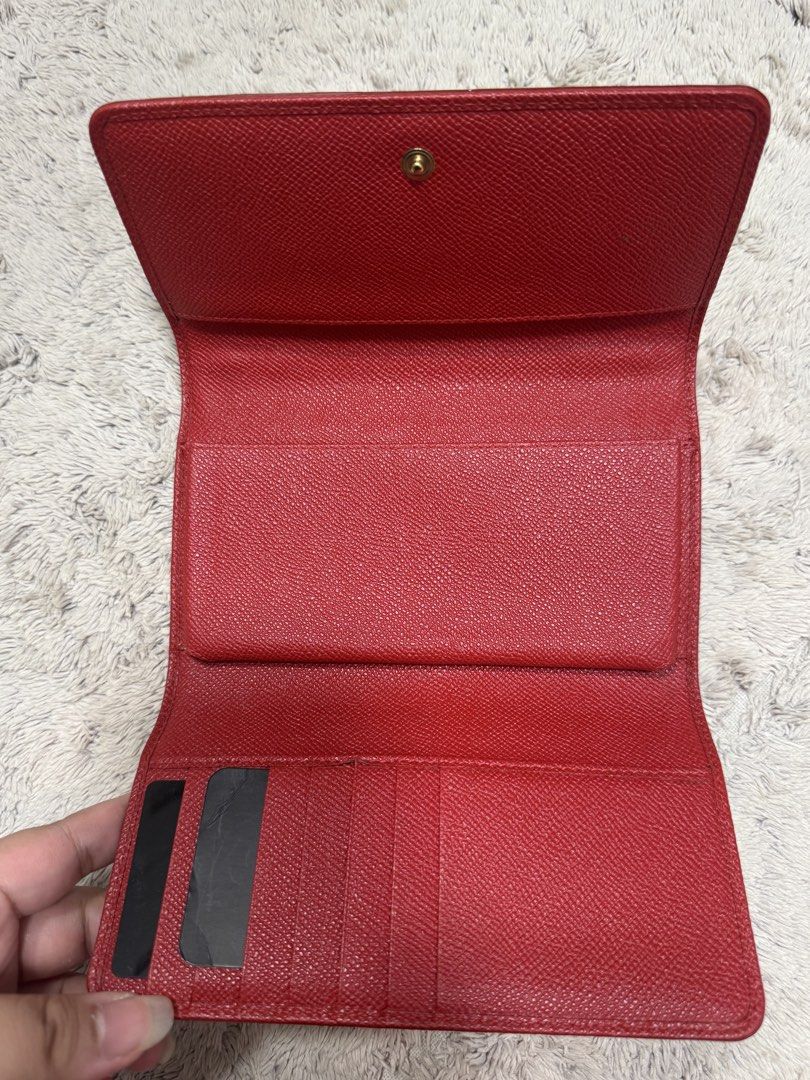 Dolce & Gabbana Purse (Category: Purses & Pouches) located in Antipolo. Submitted by nathshn_ (Listing ID 1470402109, Image 2). Description: Authentic Dolce & Gabbana red textured leather bag with stunning floral crystal embellishments and gold hardware. Features a structured top handle, flap snap closure, and interior card slots. Comes complete with authenticity card. Perfect statement piece for any outfit! Does not come with the original strap 
