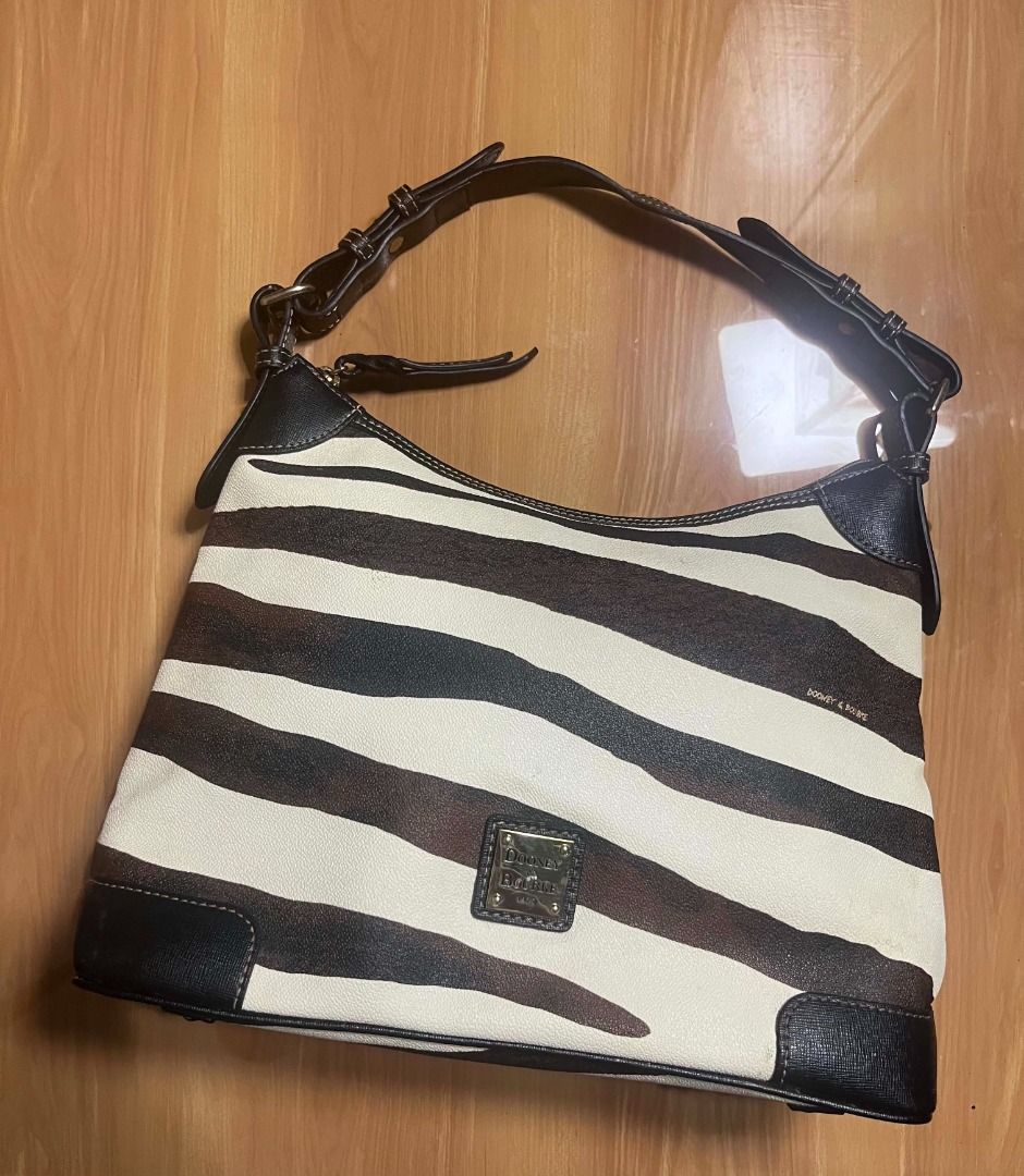 Dooney & Bourke Zebra Print Shoulder Bag (Category: Shoulder Bags) located in Manila. Submitted by senggggg. (Listing ID 1470522901, Image 2). Description: verygood condition working zip minimal stain .