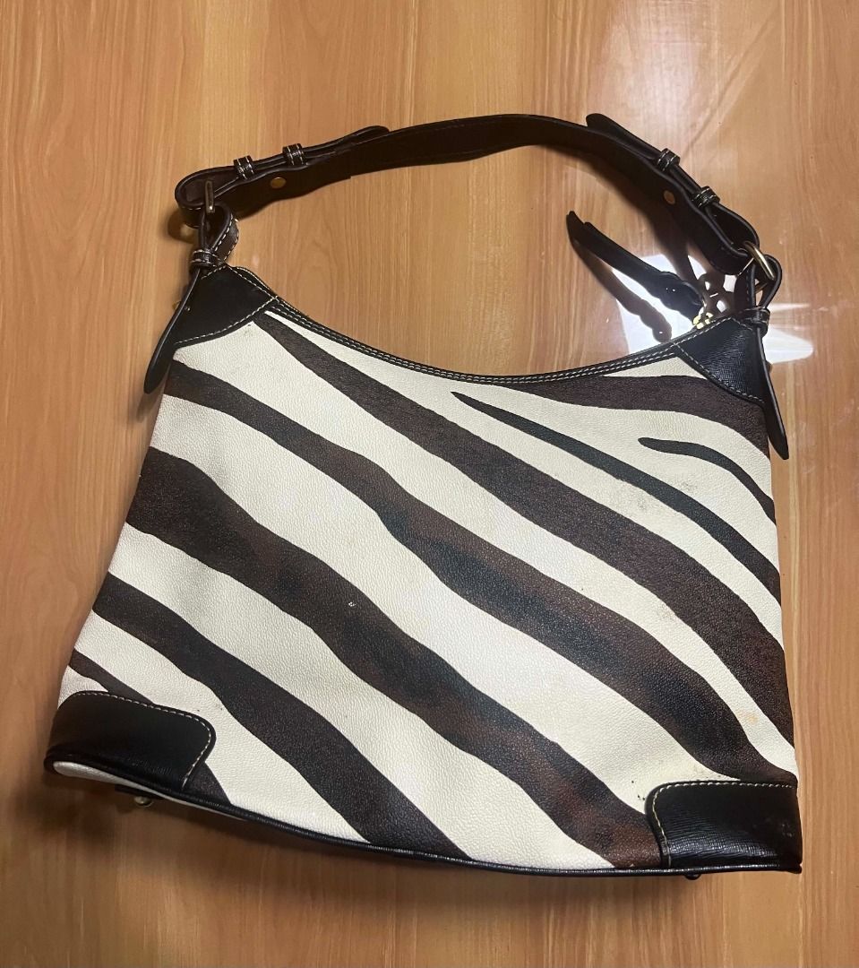 Dooney & Bourke Zebra Print Shoulder Bag (Category: Shoulder Bags) located in Manila. Submitted by senggggg. (Listing ID 1470522901, Image 3). Description: verygood condition working zip minimal stain .