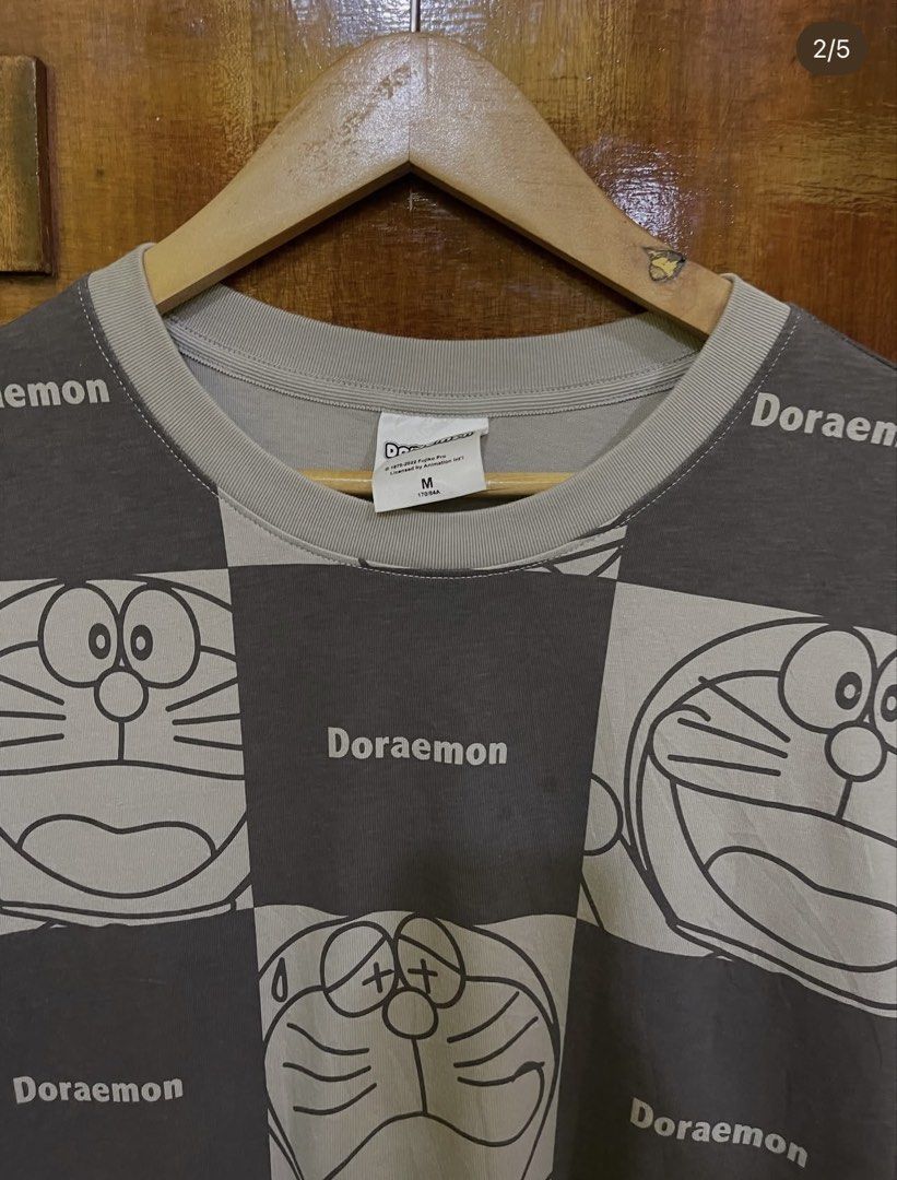 Doraemon Shirt (Category: Tshirts & Polo Shirts ) located in Marikina City. Submitted by greatfindsmnlph (Listing ID 1470429653, Image 3). Description: Dorae mon Shirt Price: 180 Size: Large Width: 22 Length: 28 Color: Dark Gray Color Rate: 10/10 Condition: 9.8/10 Very nice in actual.