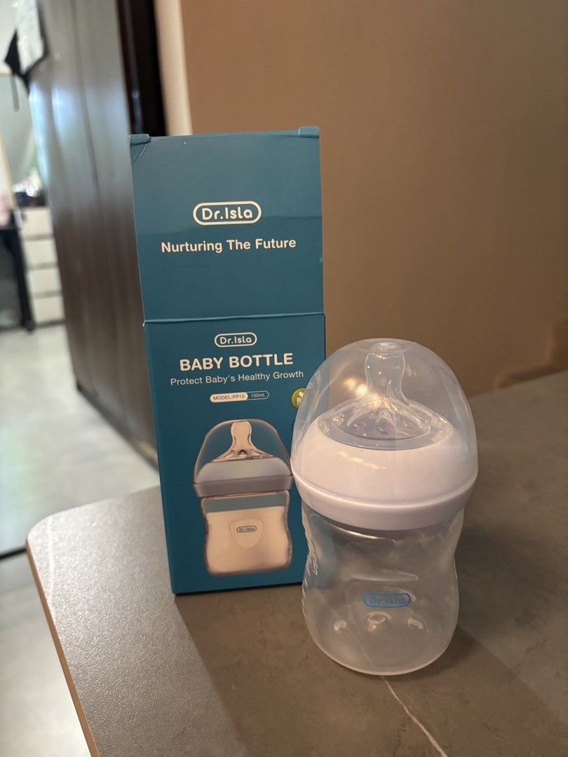 Dr. Isla Electric Breast Pump Set (Category: Breastfeeding & Bottle Feeding) located in Batangas. Submitted by mariajml (Listing ID 1470374951, Image 3). Description: - good condition - Everything pictured included in original boxes.
