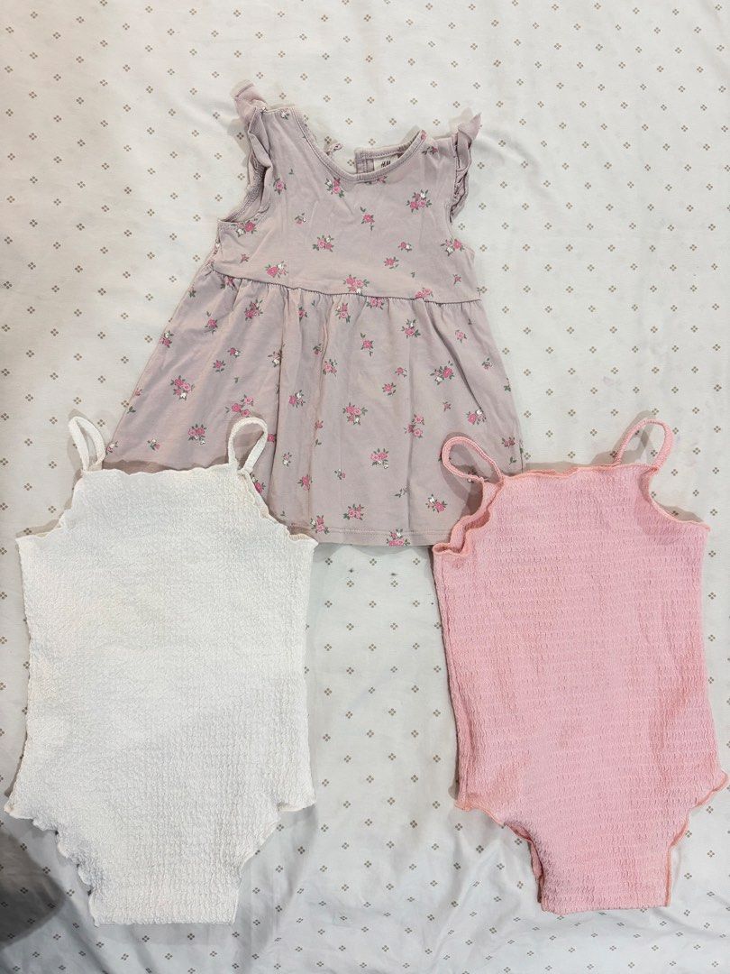 Dress & 2 pc Onesie (Category: Babies & Kids Fashion) located in Manila. Submitted by diane.preloved0328 (Listing ID 1470437837, Image 1). Description: H&M Organic Cotton Dress 6-9M Pink Onesie 9M White Onesie 9M.