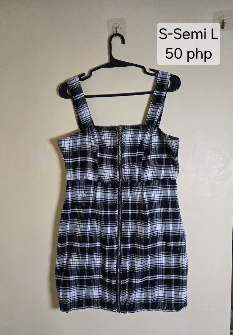 DRESSES FOR SALE (Category: Dresses) located in Quezon City. Submitted by aisarang_u (Listing ID 1470492855, Image 3). Description: MIXED DRESSES, JUMP SUIT, ROMPER 50 pesos only check photos for sizes pm for more details MOP - Gcash, Bank transfer .